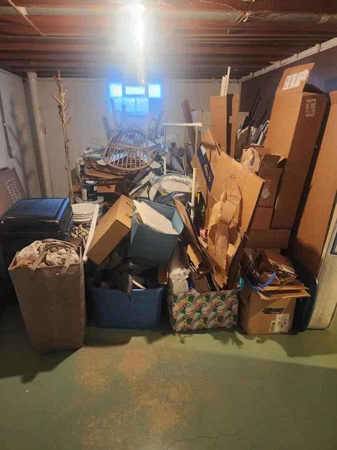 Roll-off dumpster container at job site for 2 Yard Dumpster Rental in Cherry Valley